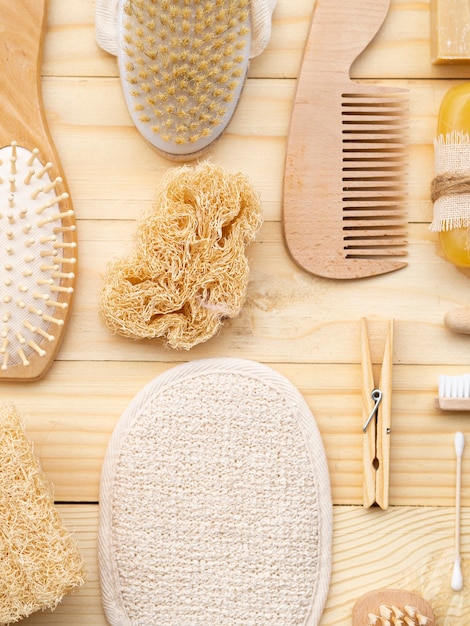 Flat lay arrangement with wooden care products