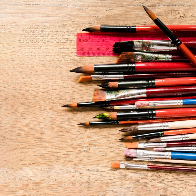 Flat lay artist brush and pencils