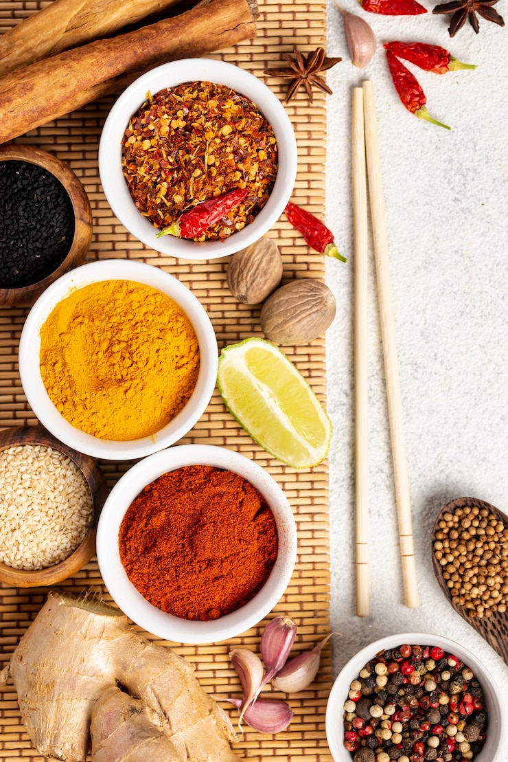 Free Photo flat lay asian food spices mix and chopsticks