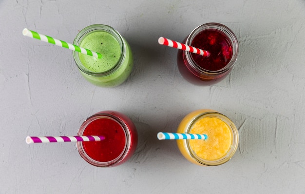Flat lay assorted smoothie glasses
