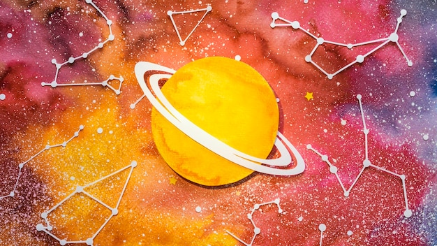 Free photo flat lay assortment of creative paper planets