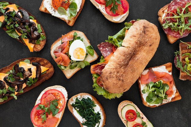 Flat lay assortment of delicious sandwiches