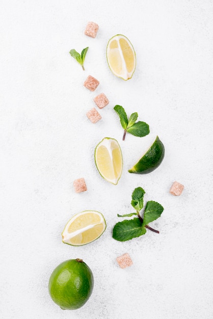 Flat lay assortment of different ingredients on white background