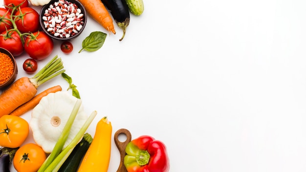 Flat lay assortment of different vegetables with copy space