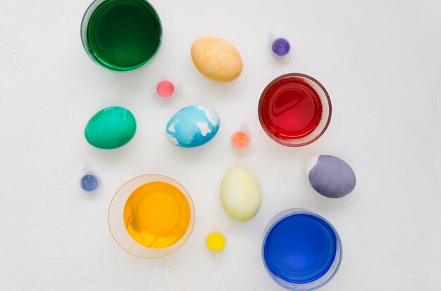 Flat lay of assortment of easter egg paint