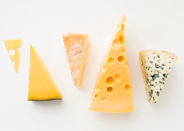 Flat lay assortment of gourmet cheese
