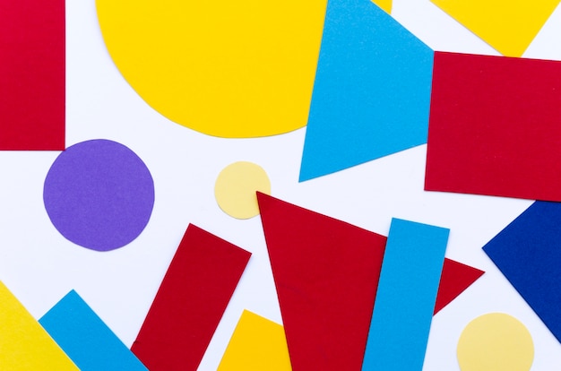 Flat lay of assortment of multicolored paper shapes