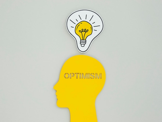 Flat lay assortment of optimism concept elements