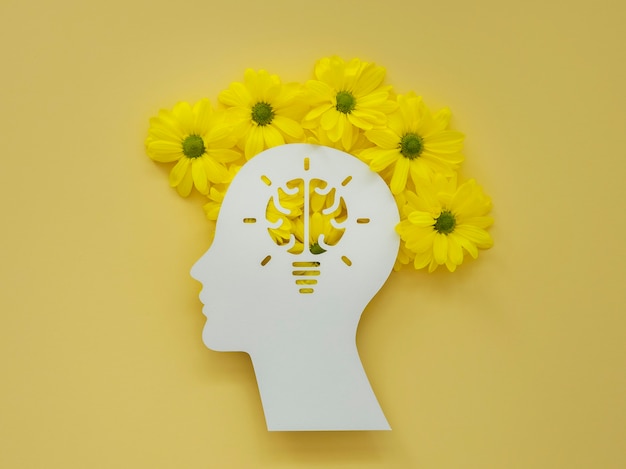 flat lay assortment of optimism concept with flowers