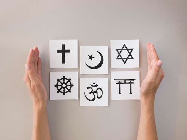 Flat lay of assortment of religious symbols
