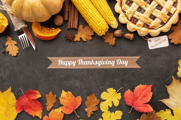 Flat lay assortment with pie and corn on stucco background