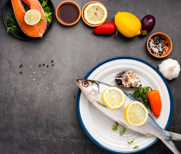 Flat lay assortment with salmon and copy-space