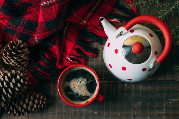 Flat lay assortment with scarf and teapot