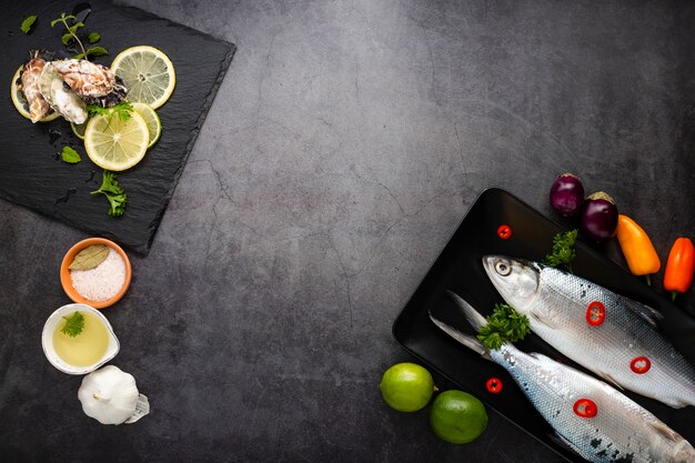 Flat lay assortment with seafood and copy-space