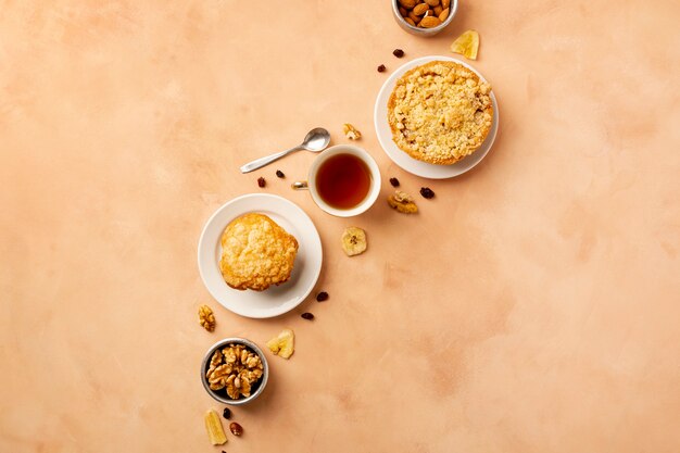 Flat lay assortment with tasty food and orange background