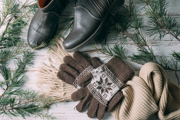 Flat lay assortment with warm clothes and shoes