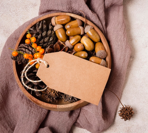 Flat lay of autumn ball with pine cones and acorns