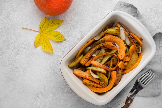 Flat lay autumn food composition on white background with copy space