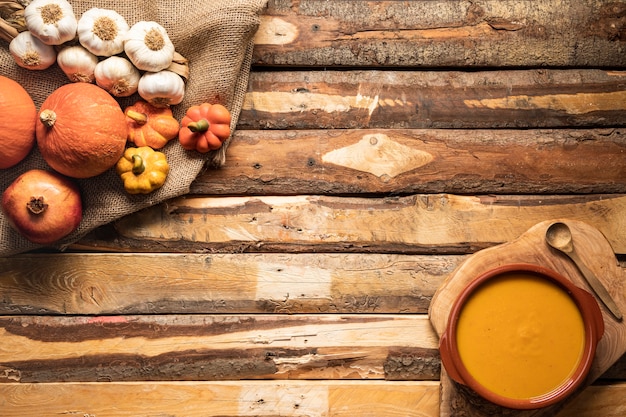 Free photo flat lay autumn harvest and soup