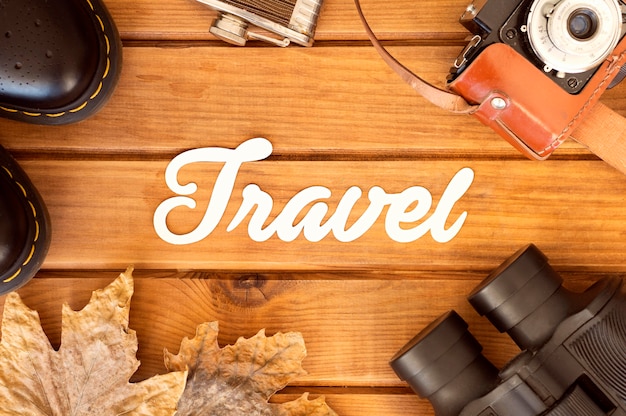 Flat lay autumn travel composition with lettering