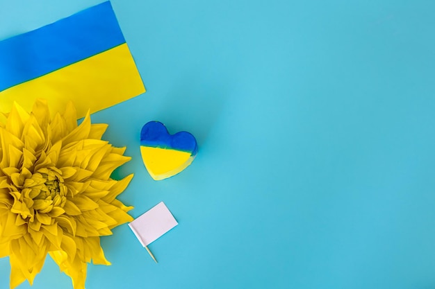 Flat lay background patriotic composition with ukrainian symbols
