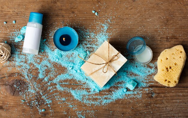 Flat lay bath concept on wooden background