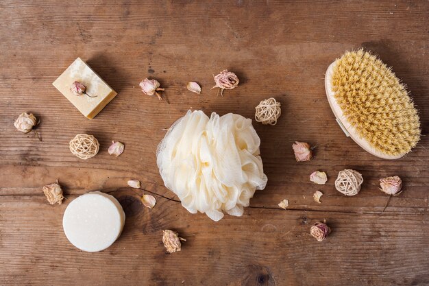 Flat lay bath items on wooden background