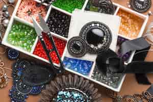 Free photo flat lay of bead working essentials