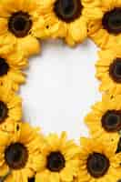 Free photo flat lay beautiful sunflower frame