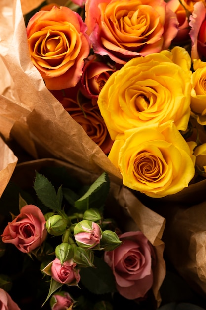 Flat lay of beautifully bloomed colorful rose flowers