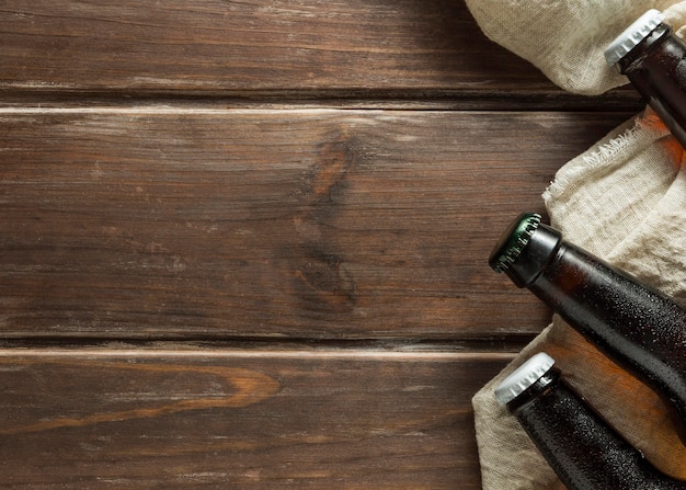 Flat lay of beer bottles with copy space