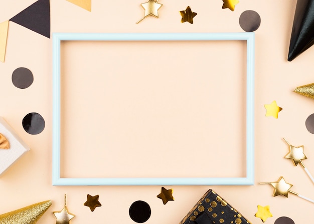 flat lay birthday decorations with frame