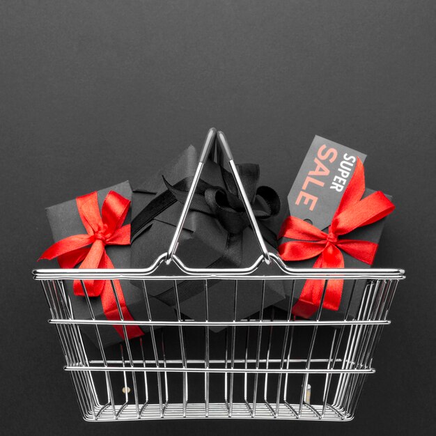 Flat lay black friday assortment on black background with copy space