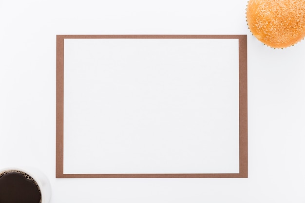 Flat lay of blank menu paper with bun