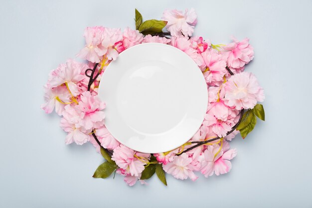 Flat lay blossom flowers on table