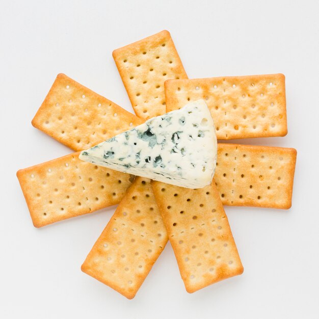 Flat lay blue cheese on crackers