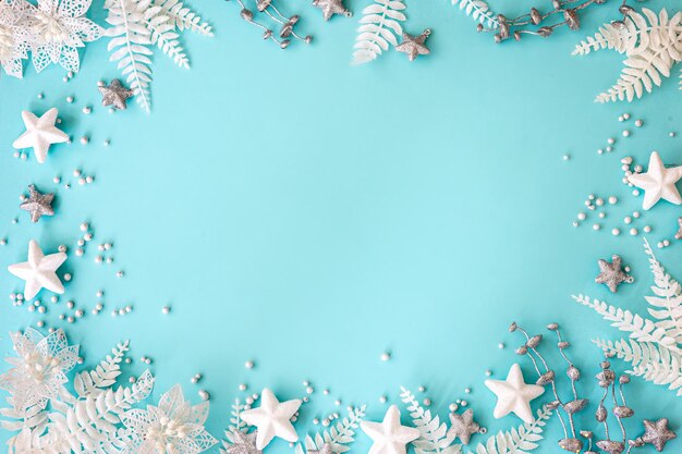 Flat lay blue Christmas background with decor details copy space