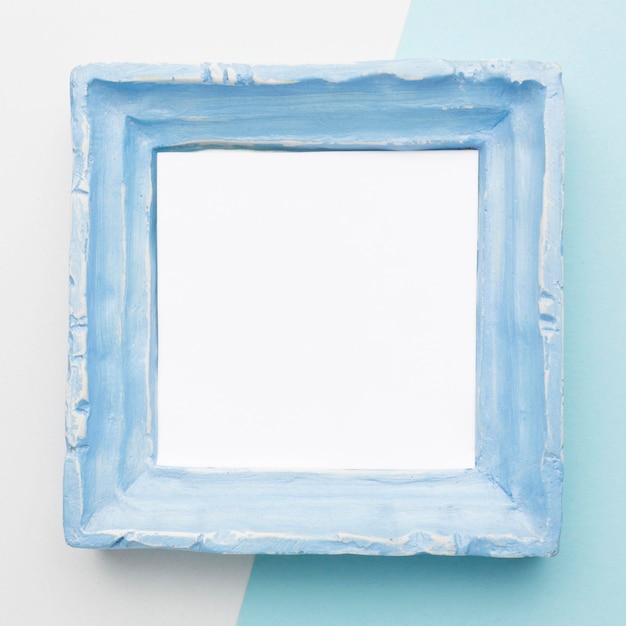 Free photo flat lay of blue frame concept