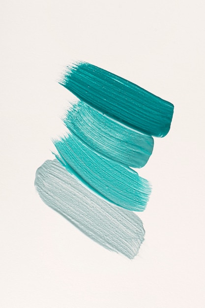 Flat lay of blue paint brush strokes