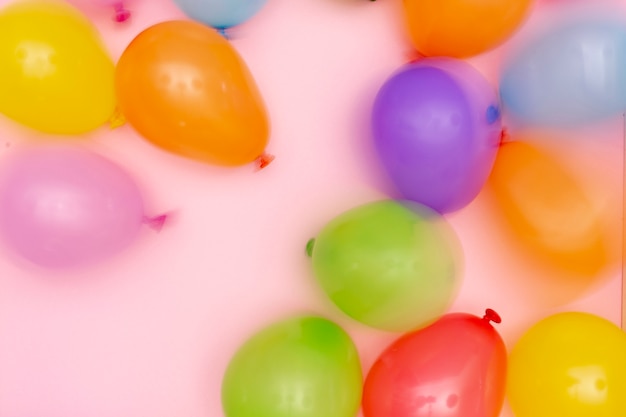 Flat lay blurred balloons arrangement