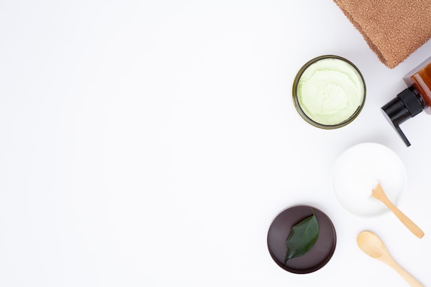 Flat lay of body butter on white background with copy space