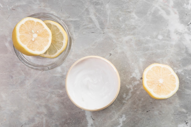 Flat lay body cream arrangement on marble background 