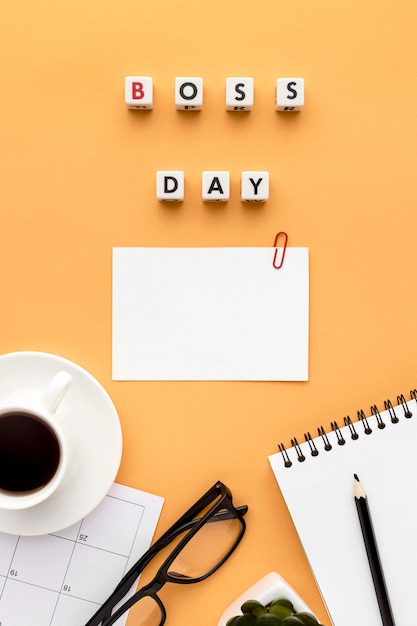 Free photo flat lay of boss day concept with copy space