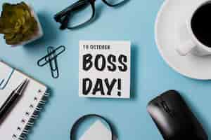 Free photo flat lay boss's day assortment on blue background