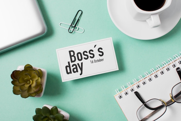 Free photo flat lay boss's day assortment on light blue background