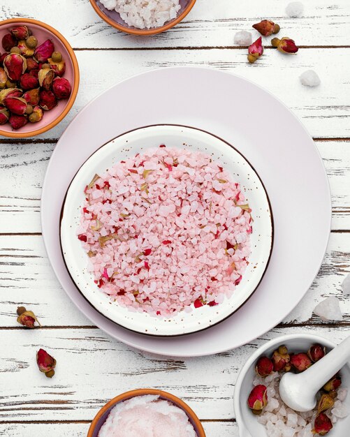 Flat lay bowl with pink salts