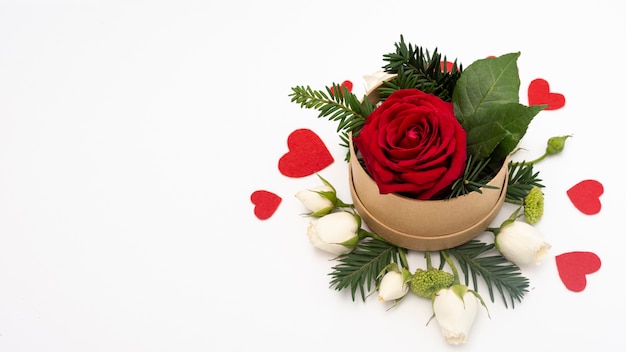 Free photo flat lay of bowl with rose and hearts