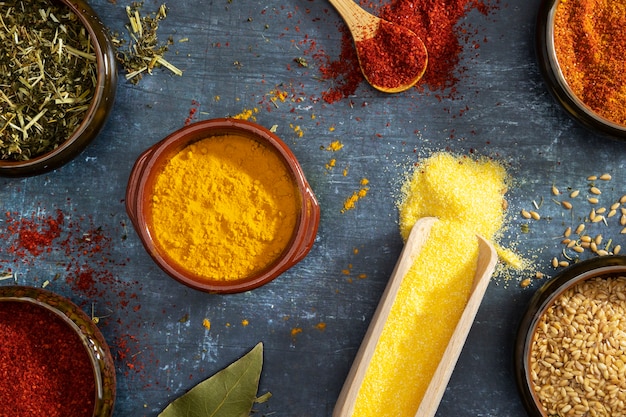 Flat lay bowls with spices arrangement