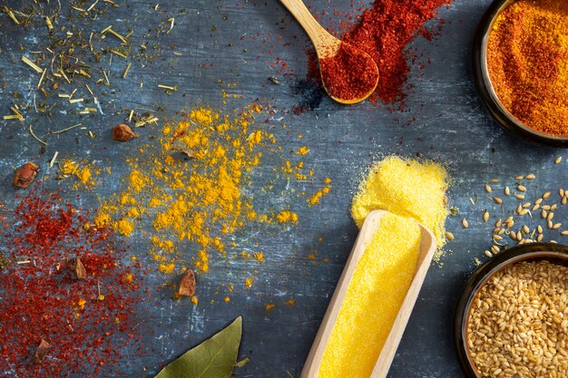 Flat lay bowls with spices assortment