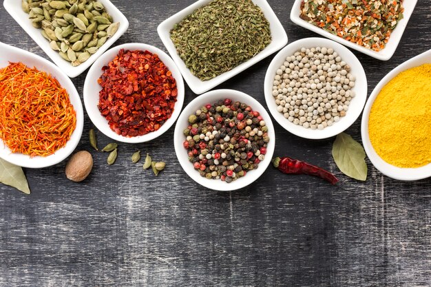 Flat lay bowls with  spices powder